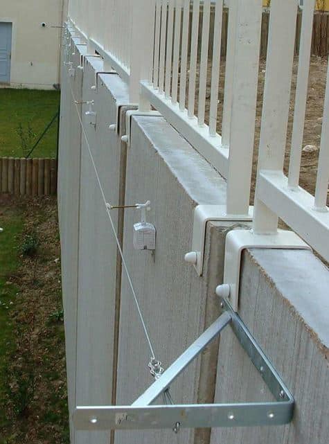 G130 gauge mounted on a bracket to monitor the tilting of a retaining wall